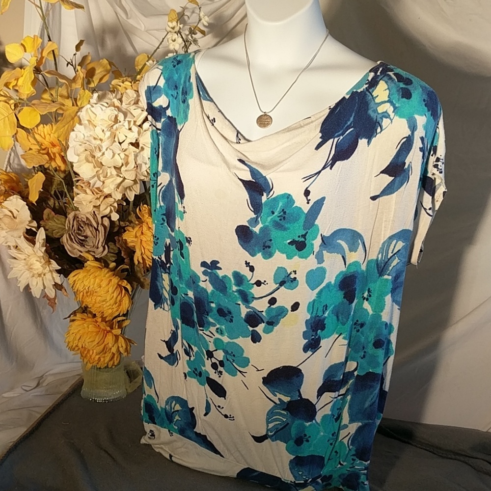 White, blue, teal, and yellow flowered top